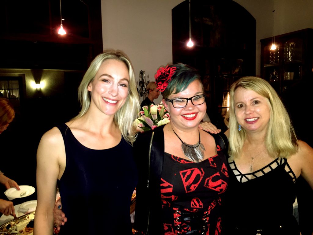 Me and Kim with Salla Simukka in front of the buffe table.