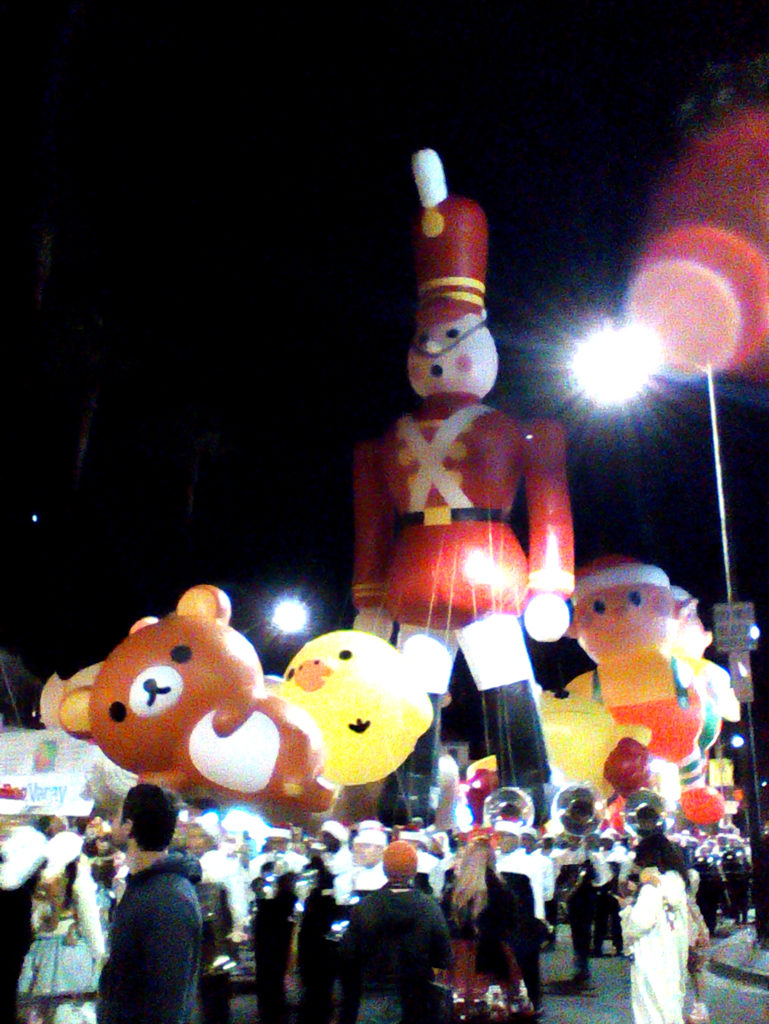 The parade balloons are waiting for the event to start.