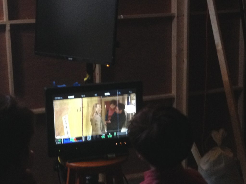 Watching the last take.