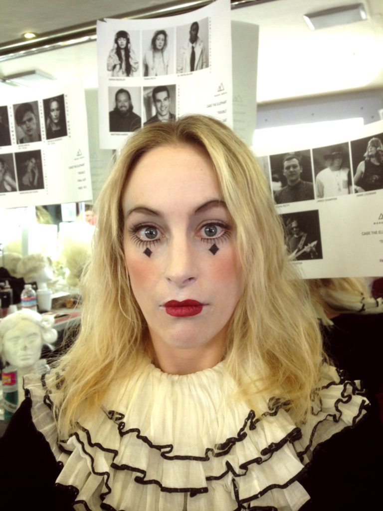 The sad clown in the trailer and the real me on the wall.