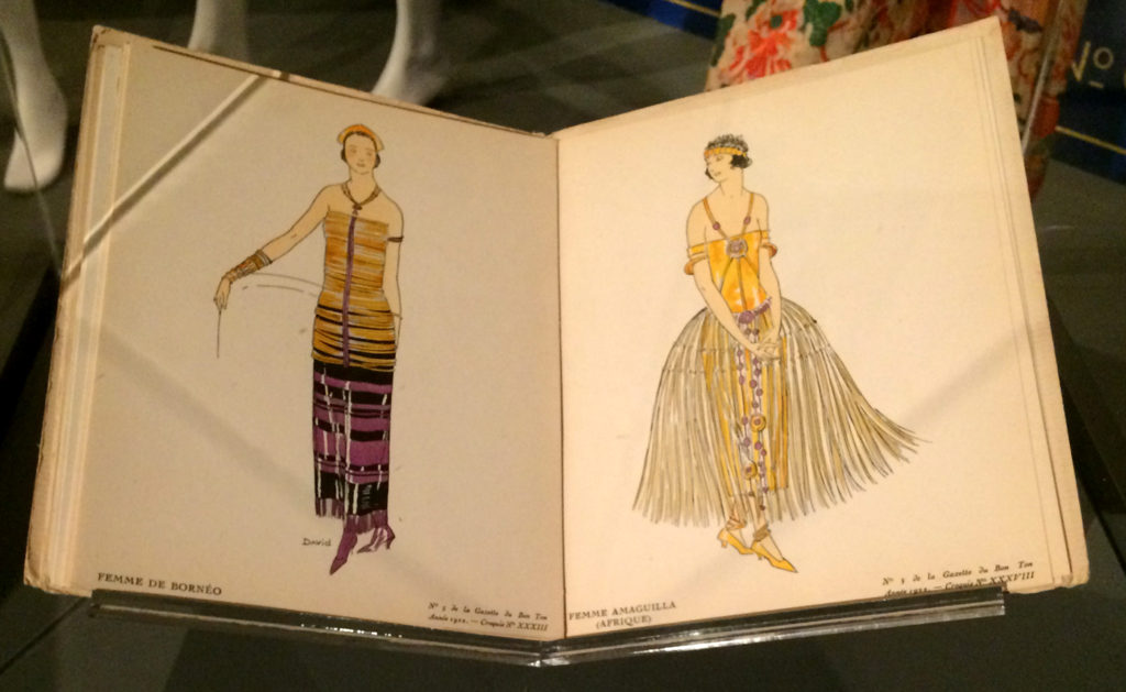 Fashion plates showing costumes of a "woman from Borneo" and "African woman".