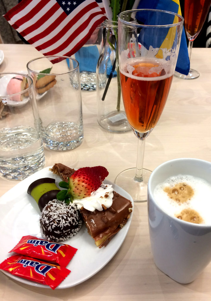 A lot of sweets and a glass of IKEA cider to celebrate the new store.