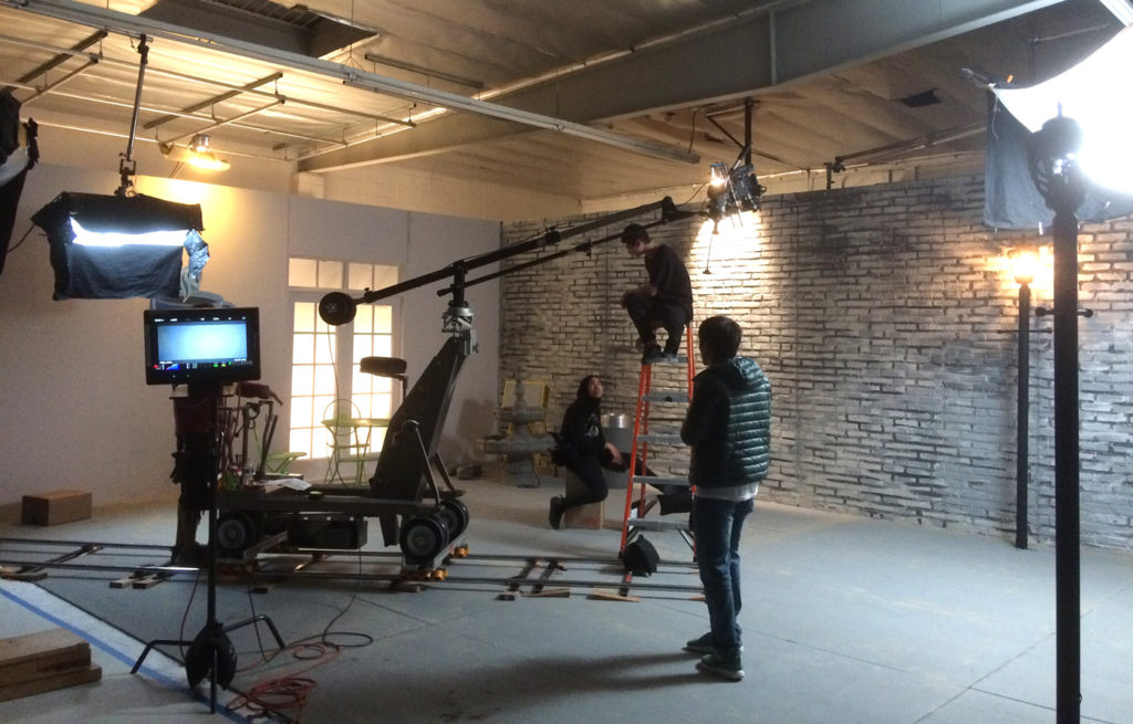 The team is preparing for the next scene.